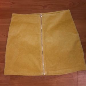 Yellow zip up mini skirt